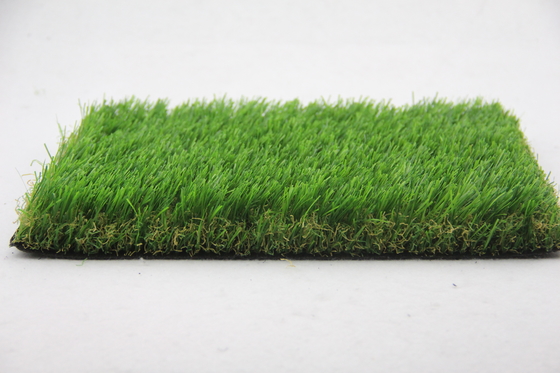 ประเทศจีน หญ้าพรมสวนธรรมชาติวางหญ้ากลางแจ้งสีเขียว Footbal Turf 35mm ผู้ผลิต