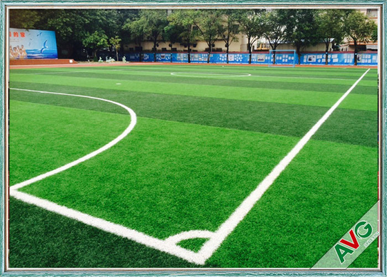 จีน โฟมฟุตบอลสนามหญ้าสังเคราะห์มาตรฐาน ISO 14001 13000 Dtex สำหรับสนามฟุตบอลระดับมืออาชีพ ผู้ผลิต